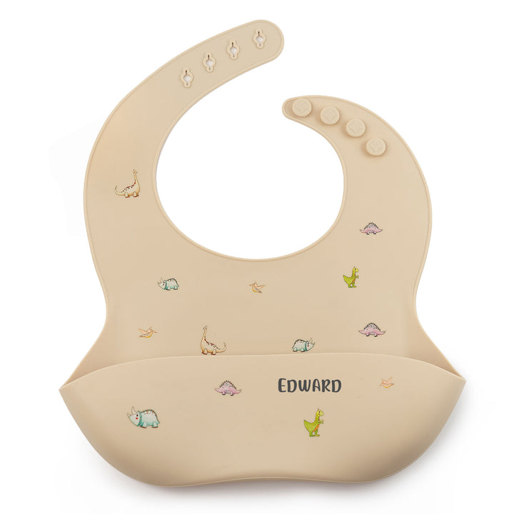 JBØRN Silicone Baby Feeding Bib Dinosaurs Vanilla - Personalisable Baby Products Sold and Personalised by JustBørn